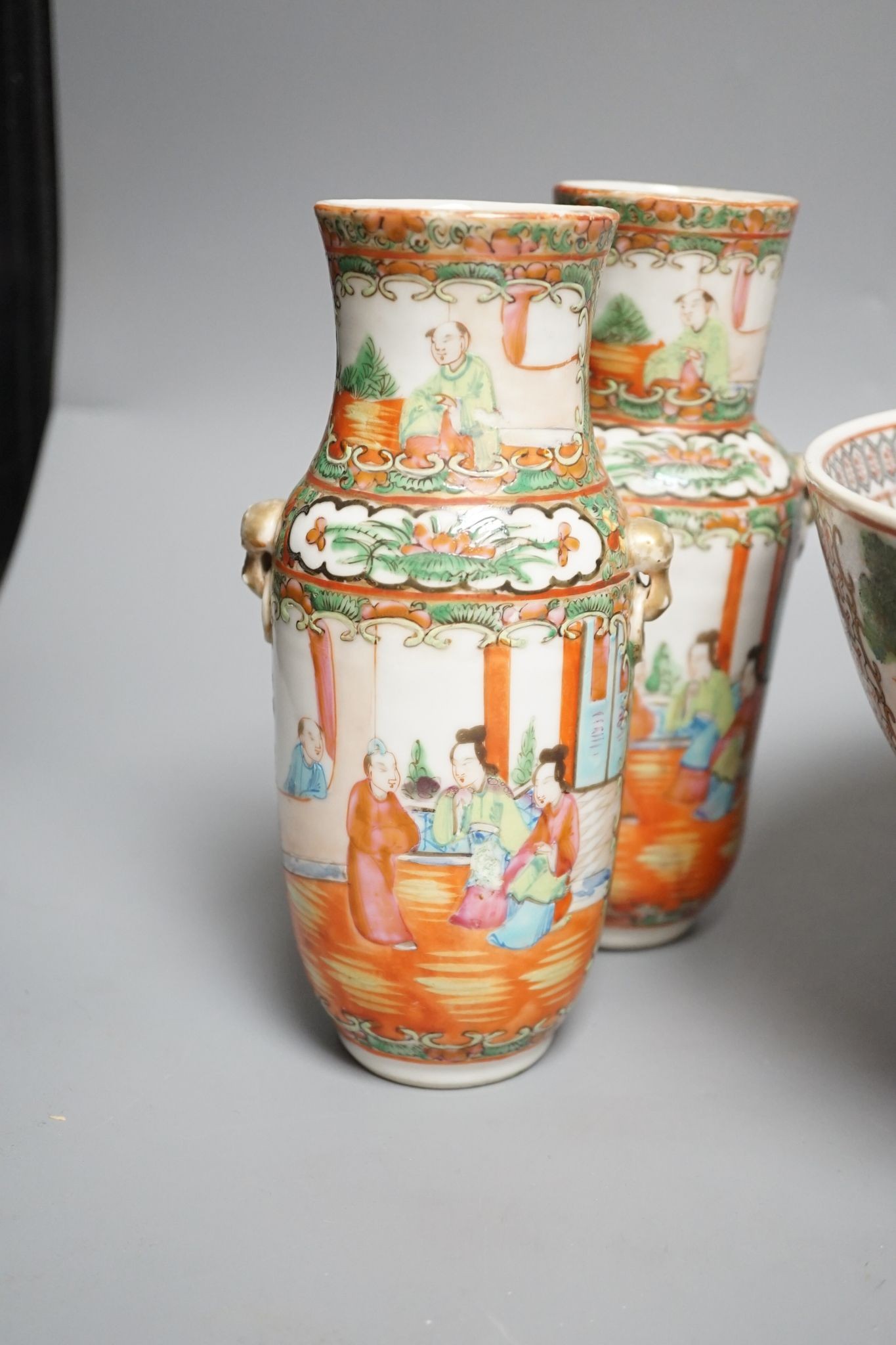 A pair of Chinese Canton famille rose vases and a bowl on stand
